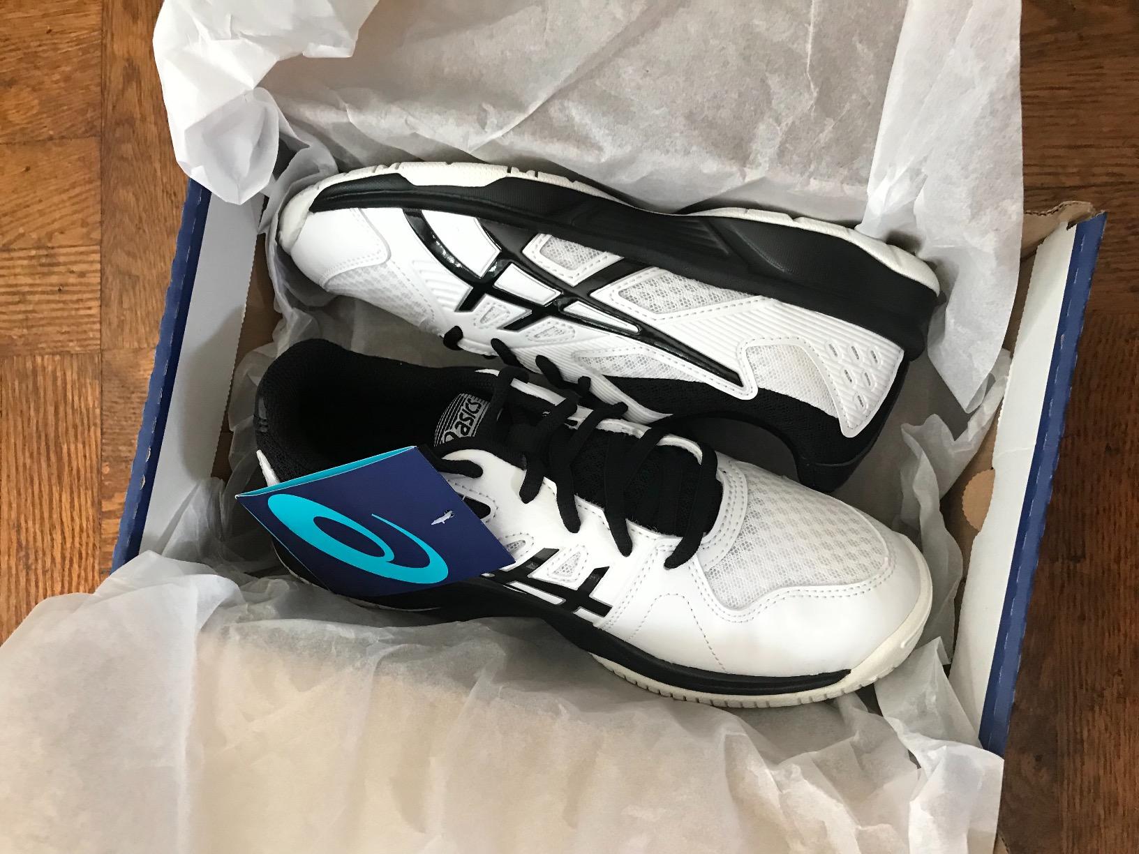 ASICS Upcourt 3 GS volleyball shoes showing court traction pattern and sole design