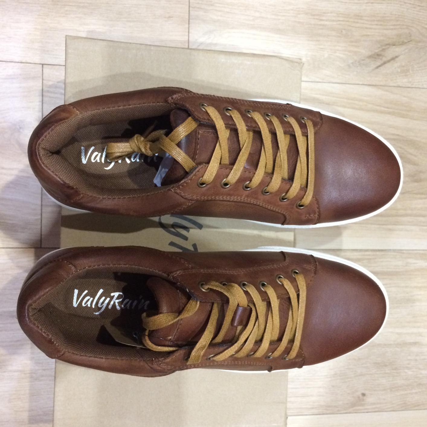 Wearing Jousen business casual sneakers in an office setting