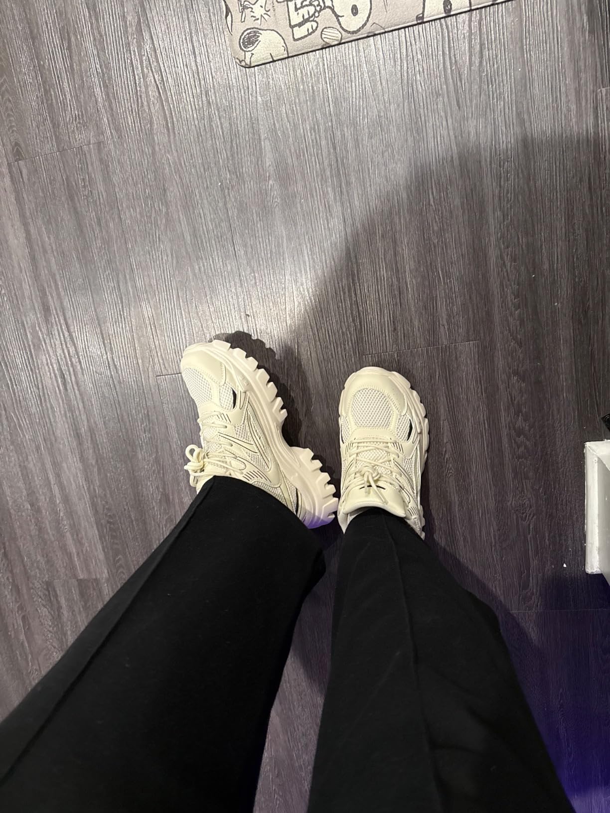 Close-up detail of DREAM PAIRS Maeve sneakers showing vegan leather and mesh construction