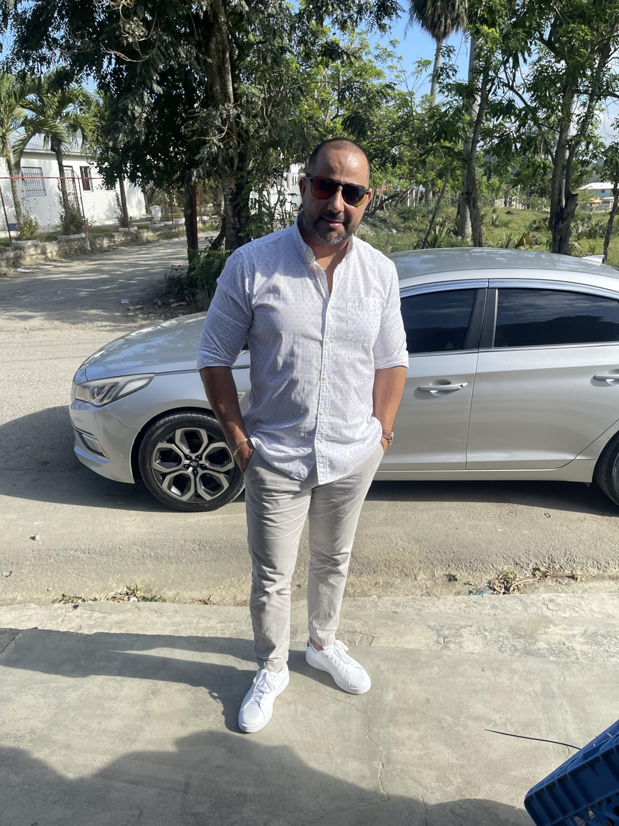 Close-up detail of Adidas Advantage 2.0 showing synthetic leather upper construction and perforated 3-stripes design