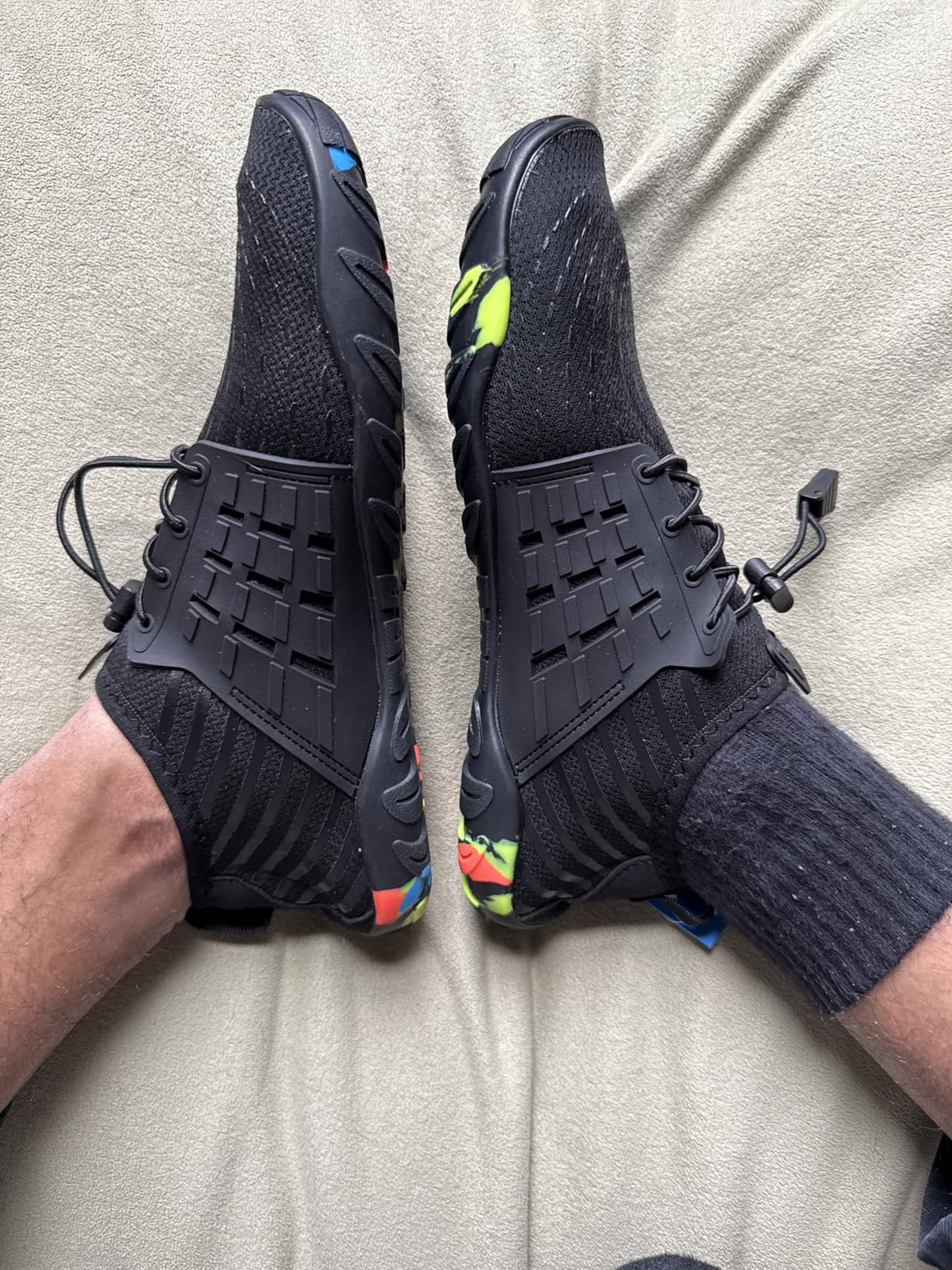 Close-up view of WateLves water shoes elastic lacing system and breathable mesh upper