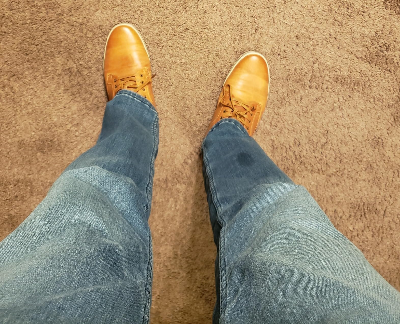 On-foot shot of Jousen sneakers with chinos