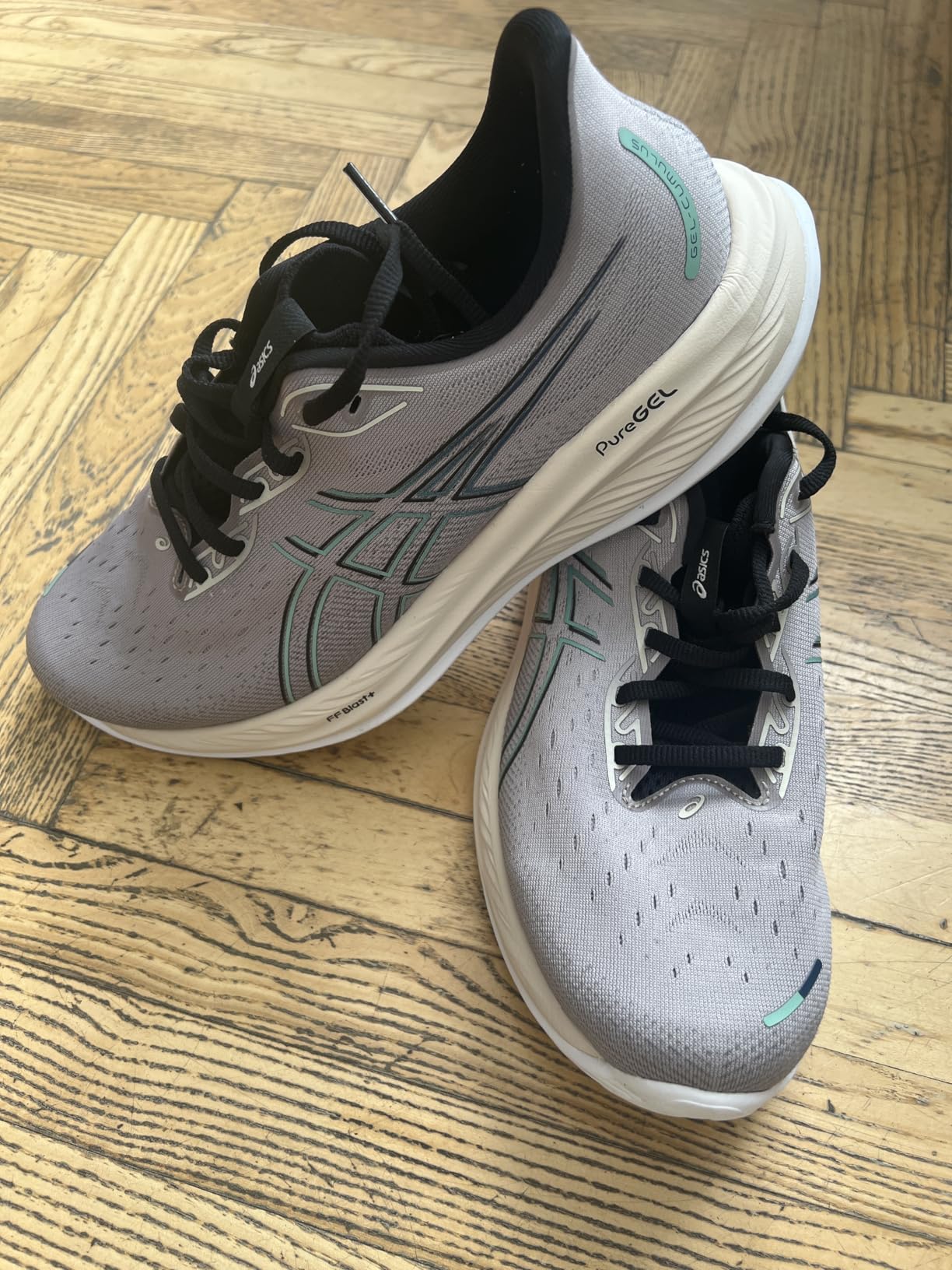 ASICS Men's Gel-Cumulus 26 running shoe showing FF BLAST PLUS midsole technology and engineered mesh upper design