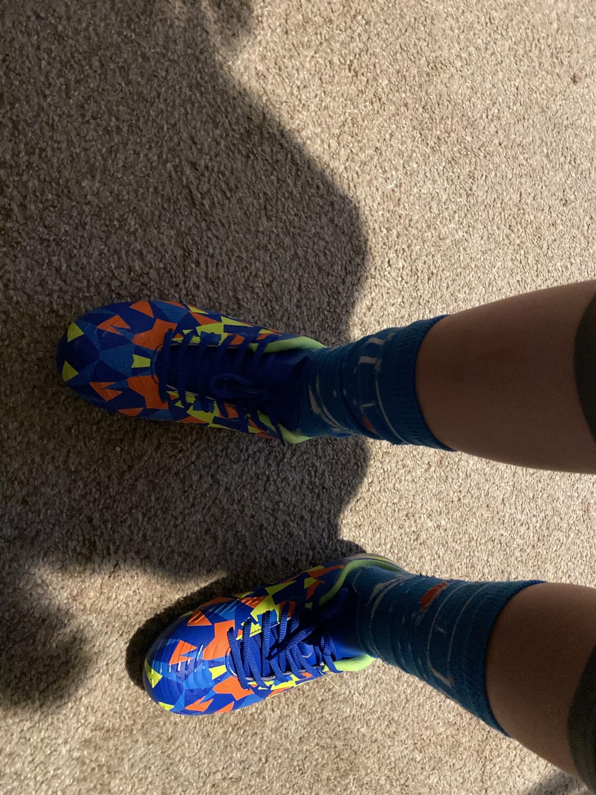 MIFAWA Kids Soccer Cleats in blue and black colorway, full side profile view