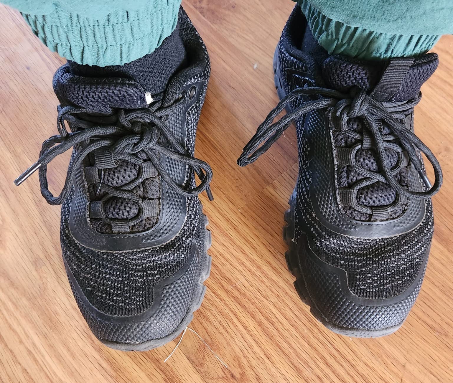 Ulogu hiking shoes on trail showing grip pattern and performance on rocky terrain