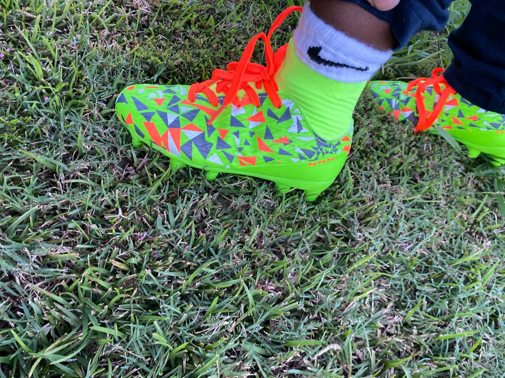 DREAM PAIRS soccer cleats detail shot showing textured upper and stud pattern