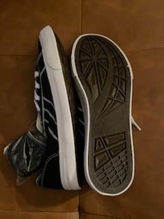 Close-up detail of Blake Sneaker canvas material texture and rubber sole construction