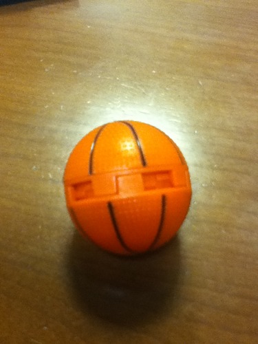 Multiple sneaker balls showing size comparison and basketball design details