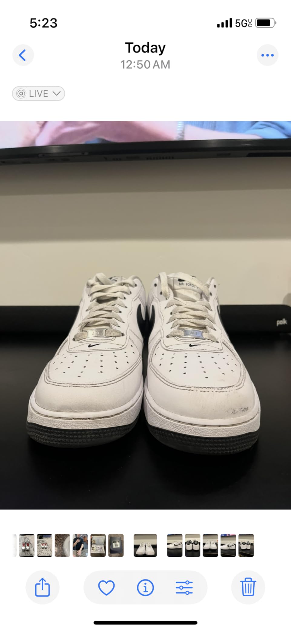 Close-up of Wilkins Sneaker Whitener sponge applicator showing white paint consistency