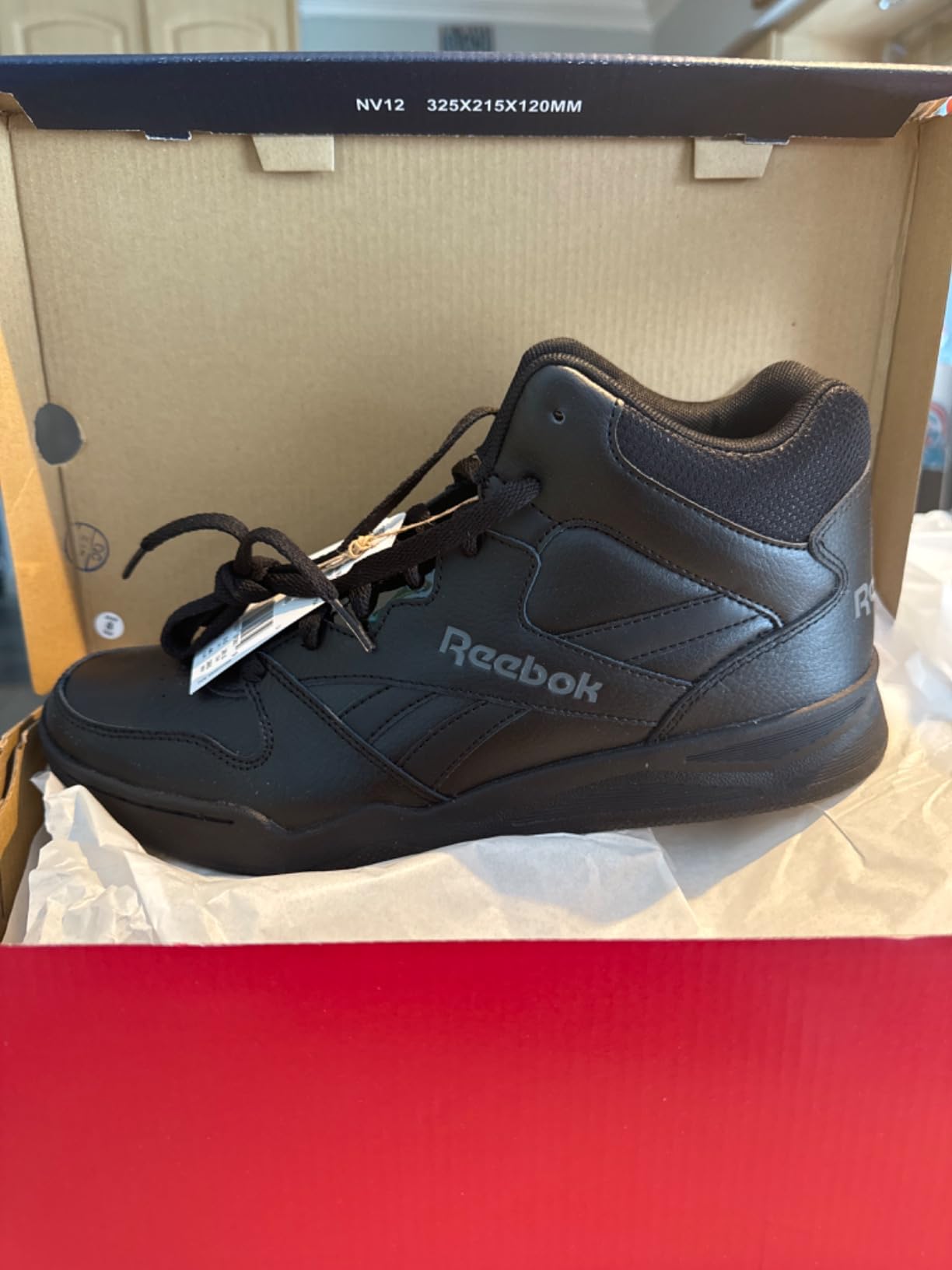 Reebok BB4500 Hi2 showing all-black colorway and classic basketball high-top silhouette