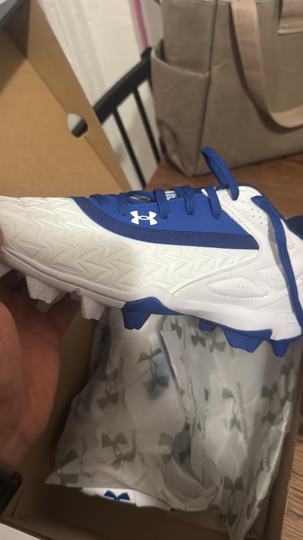 Under Armour Leadoff Low RM 3.0 Baseball Cleat in black colorway showing molded rubber cleats and low-cut profile