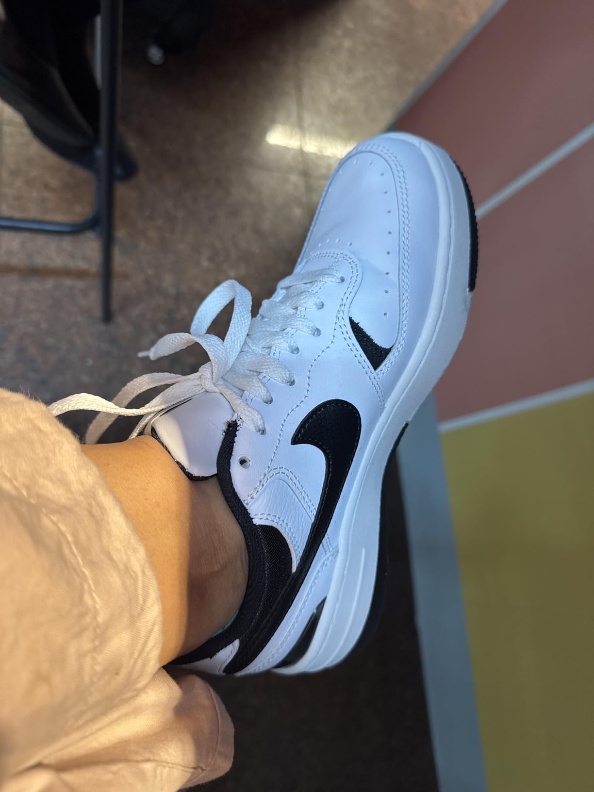 Nike Women's Gamma Force white and black colorway showing classic basketball-inspired design