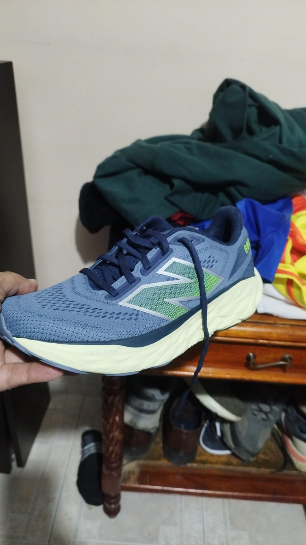 New Balance 880 V14 in action showing smooth heel to toe transition during road running