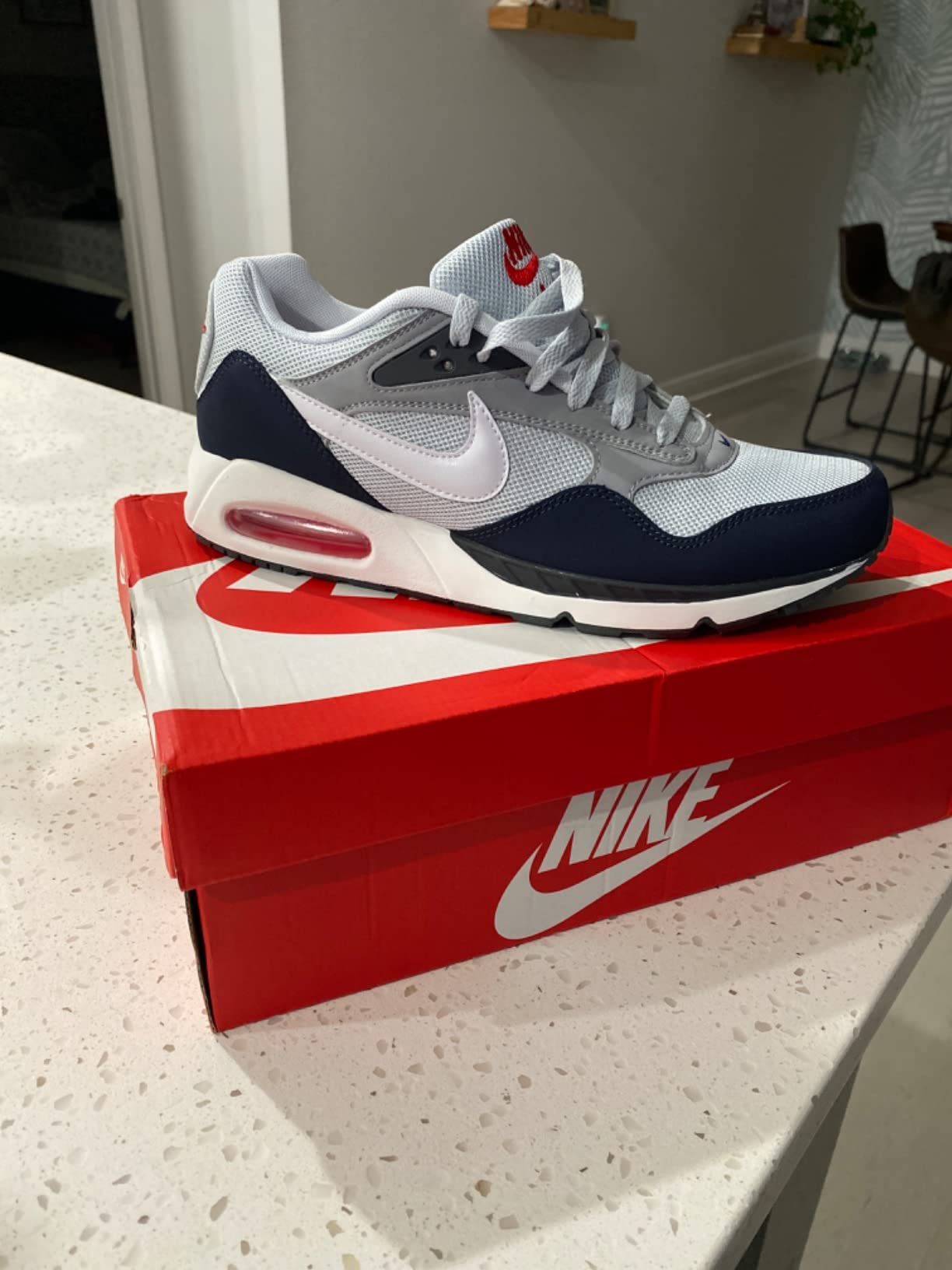 Nike Air Max Correlate side profile showing swoosh design and air max sole unit