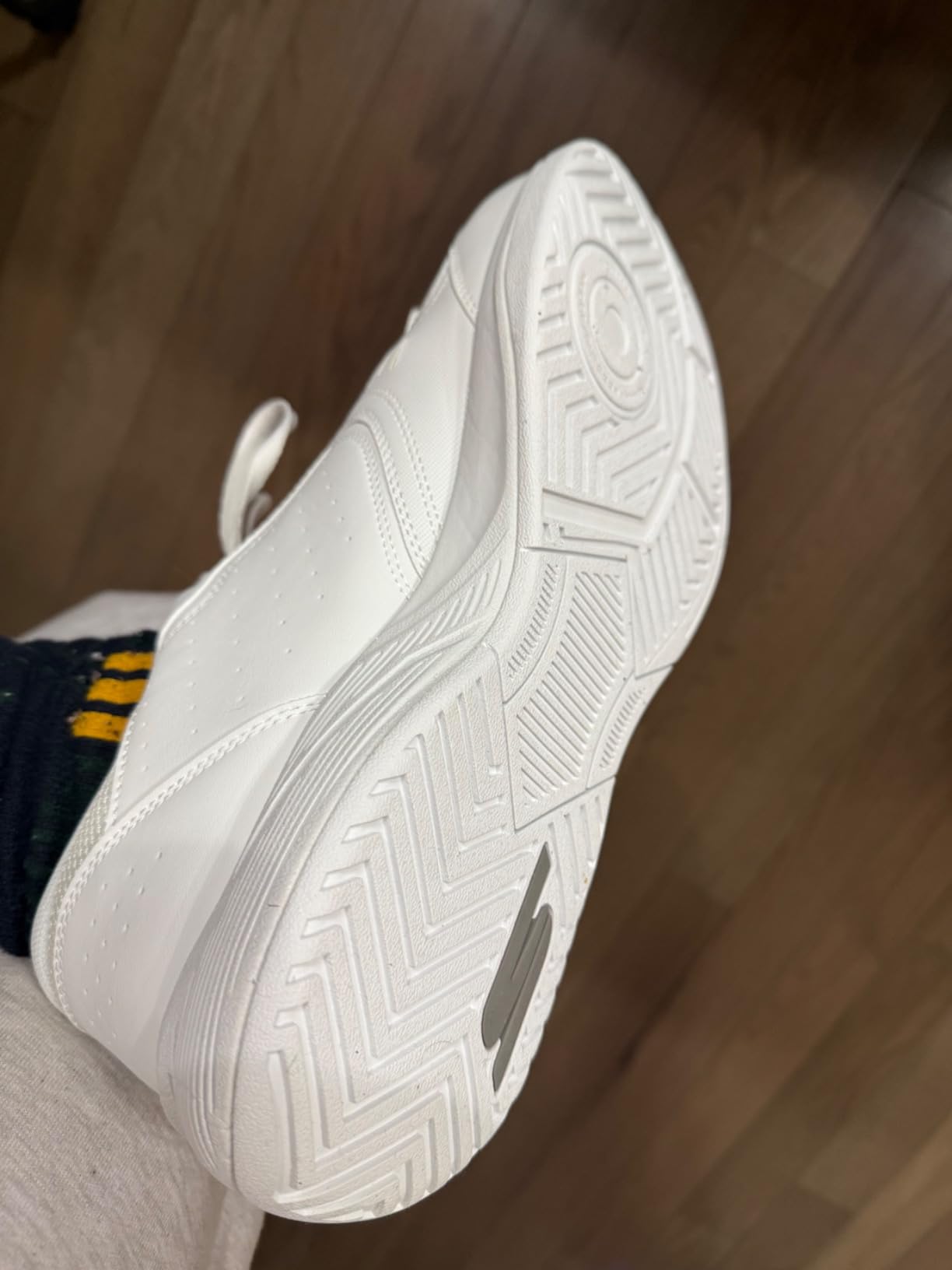 Skechers Viper Court Smash being tested on pickleball court surface showing outsole grip pattern during lateral movement