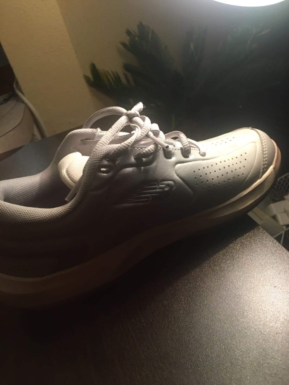 Close-up view of New Balance 696 V5 upper mesh and lacing system