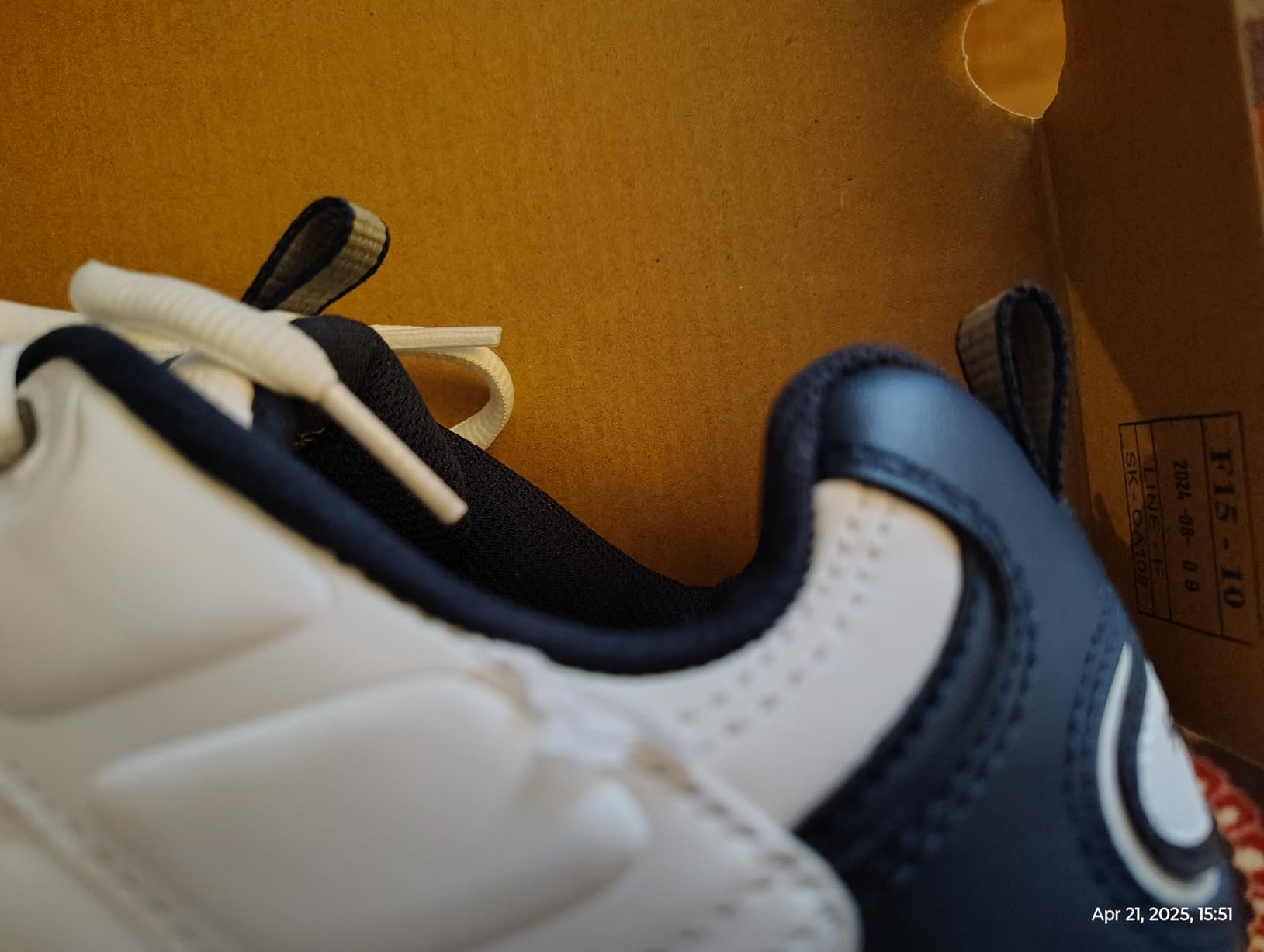 Close-up of Skechers Energy Afterburn leather upper construction and lace system detail