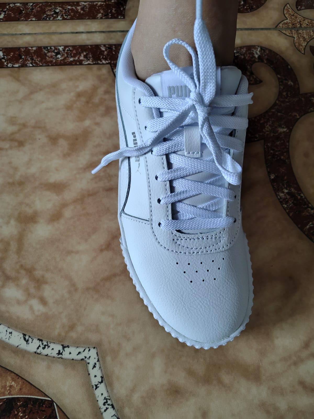 PUMA Carina L sneaker showing durability after 6 weeks of daily wear testing in various conditions