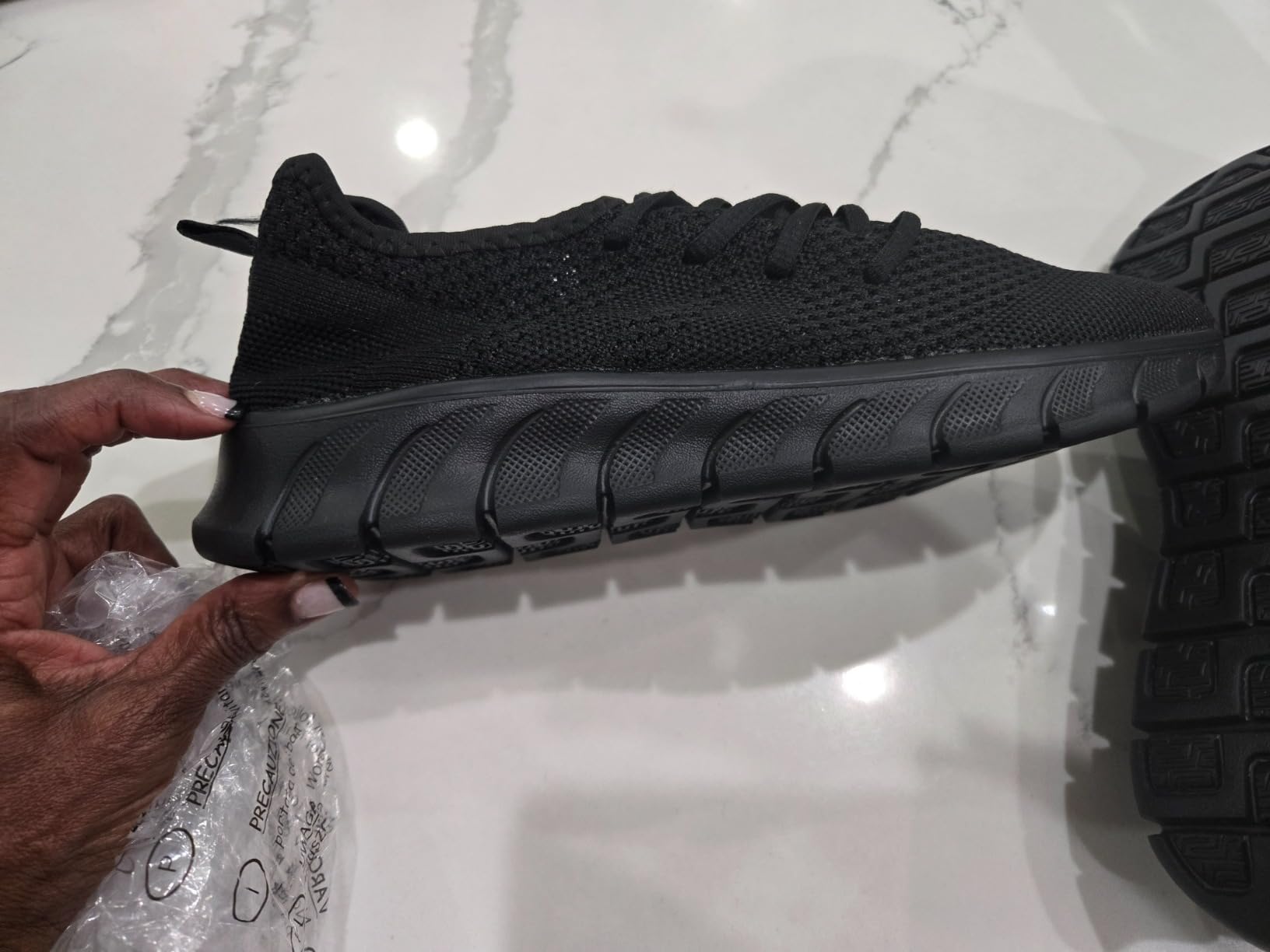 GDEKLO Women's Athletic Sneakers in white mesh showing lightweight EVA sole design