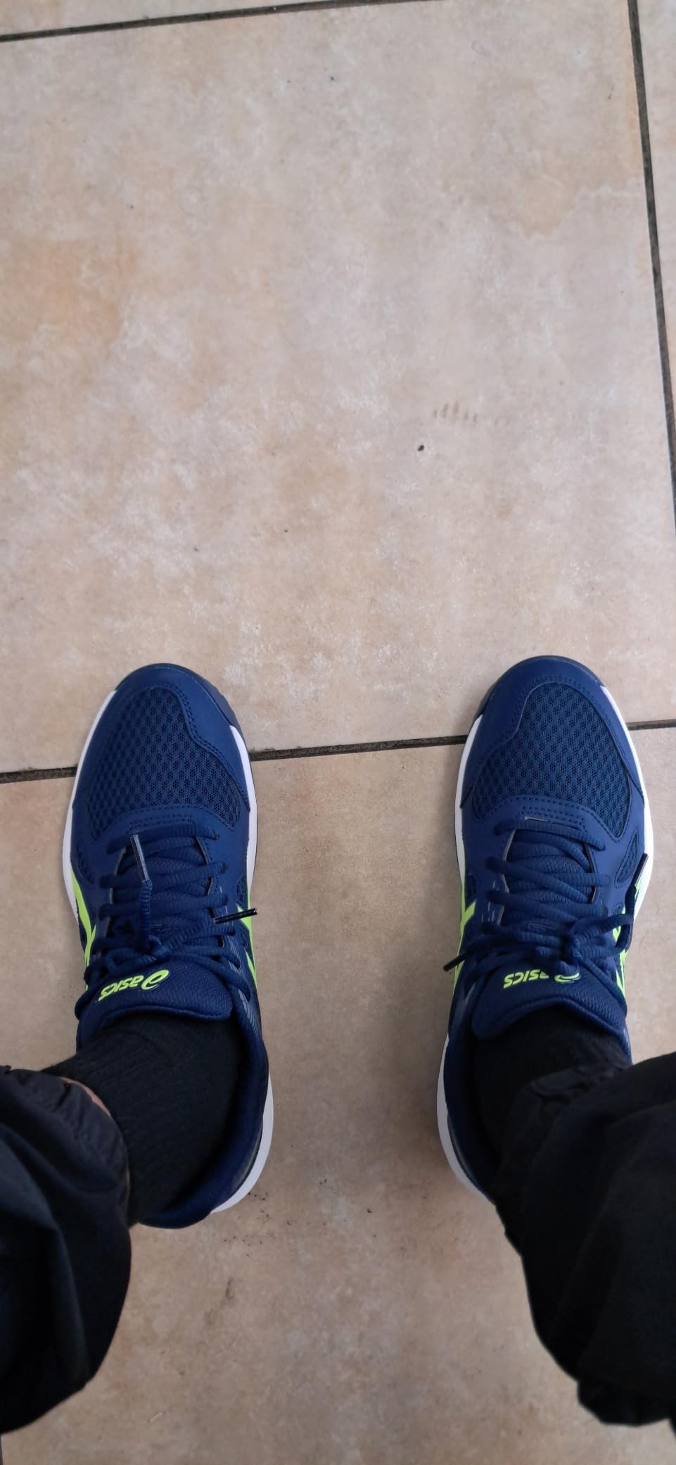 ASICS Upcourt 6 volleyball shoes in action showing lateral support and court performance