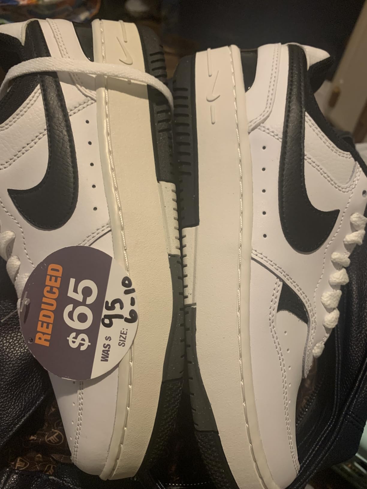 Nike Gamma Force side profile showing retro basketball silhouette and premium materials