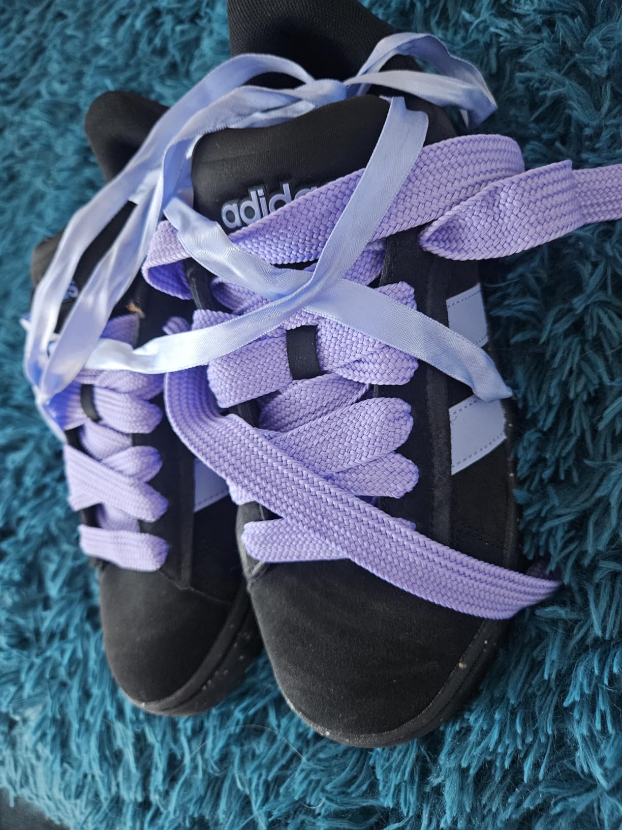 Side view of Adidas Grand Court Alpha 00s showing chunky sole profile and design details