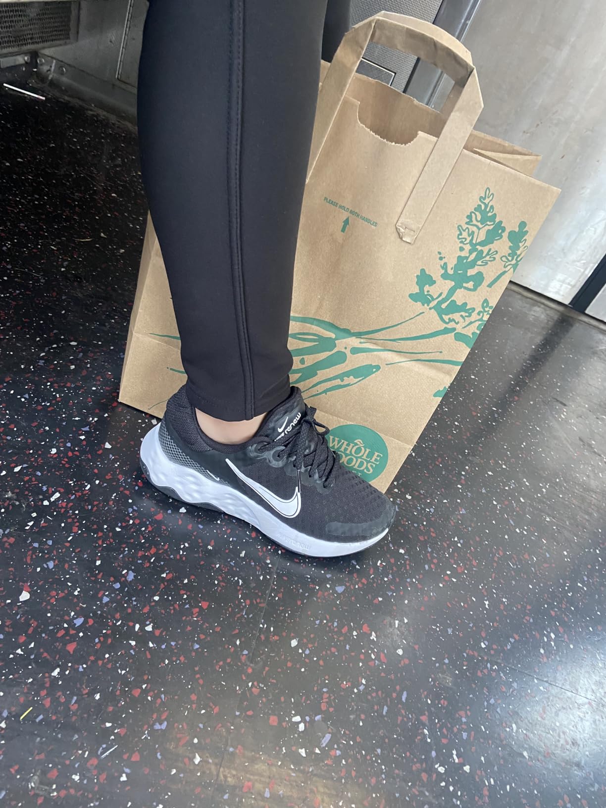 Nike Women's Renew Ride 3 full side profile showing clean design construction and Nike branding