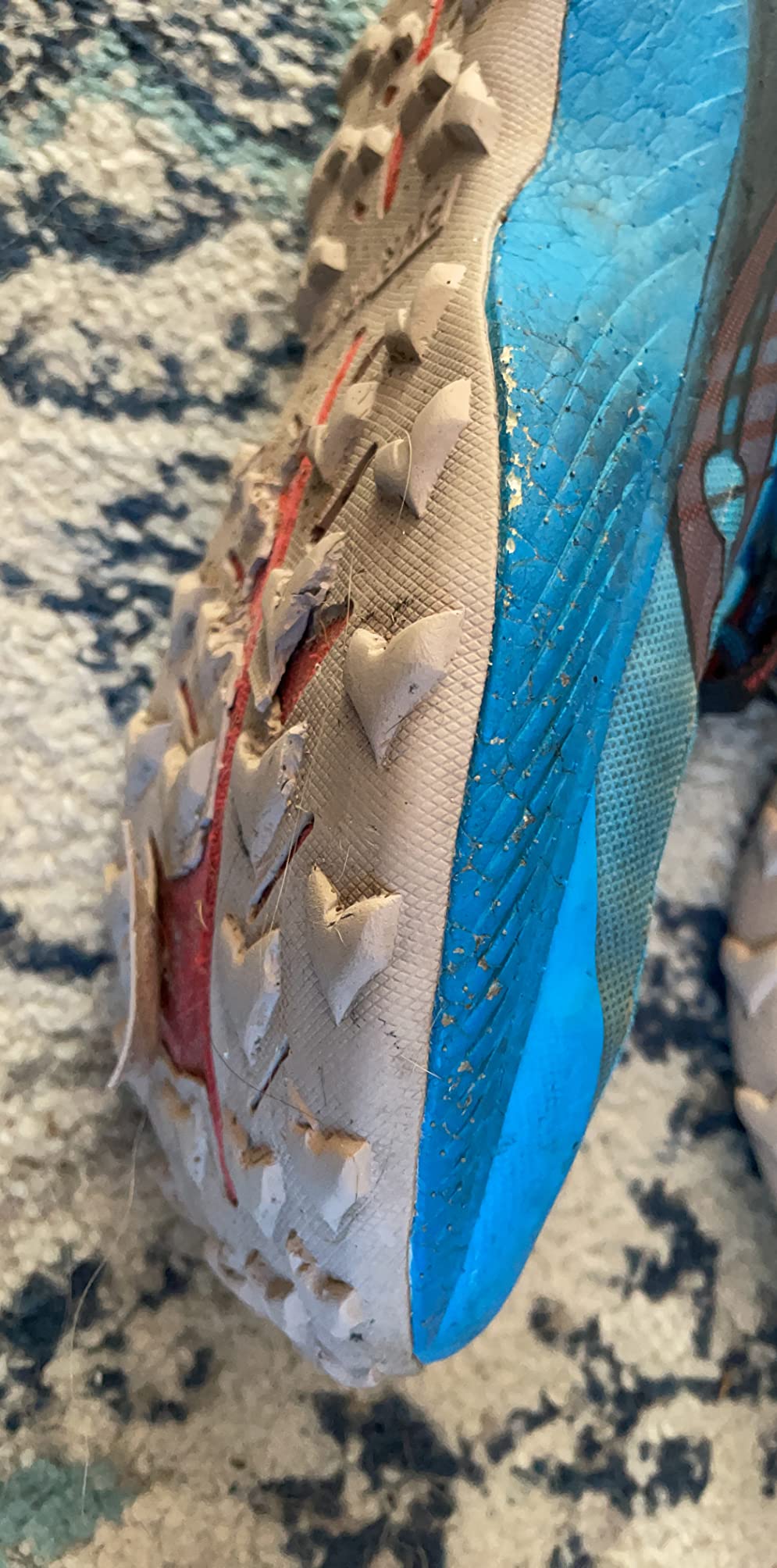 Saucony Endorphin Edge outsole showing PWRTRAC rubber wear and lug pattern after 300 miles