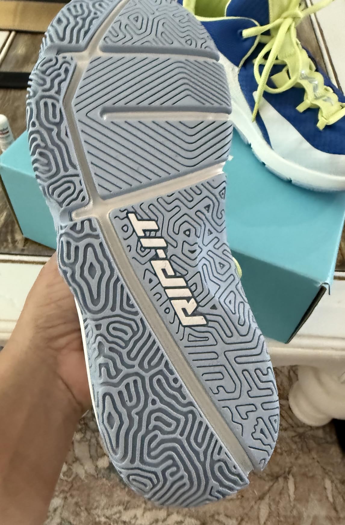 PUMA Women's Voltaic Evo cross training shoes white blue colorway showing mesh upper and cushioned sole profile