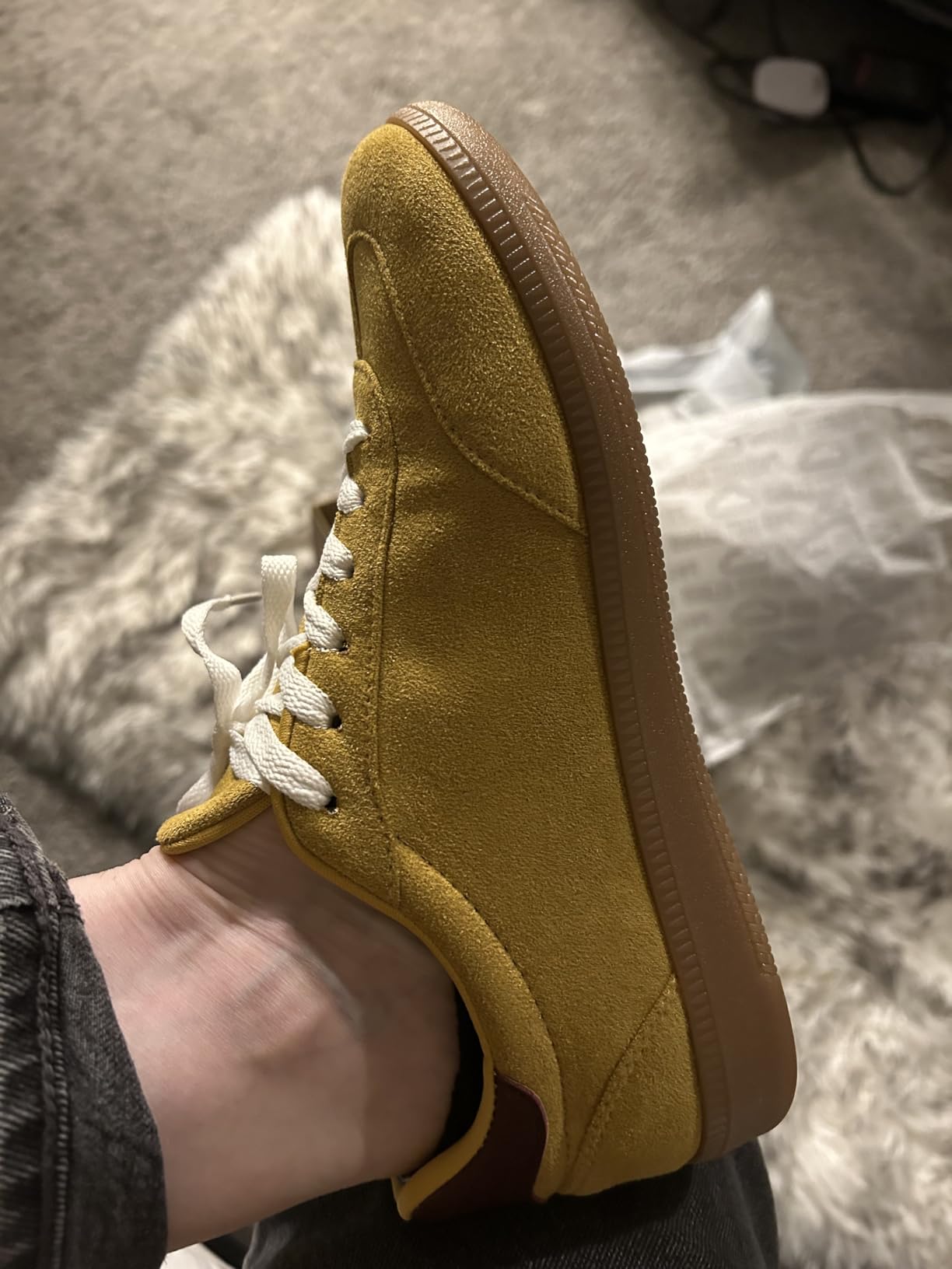 Close-up of Project Cloud Sneakers showing action leather upper and lace-up closure design details