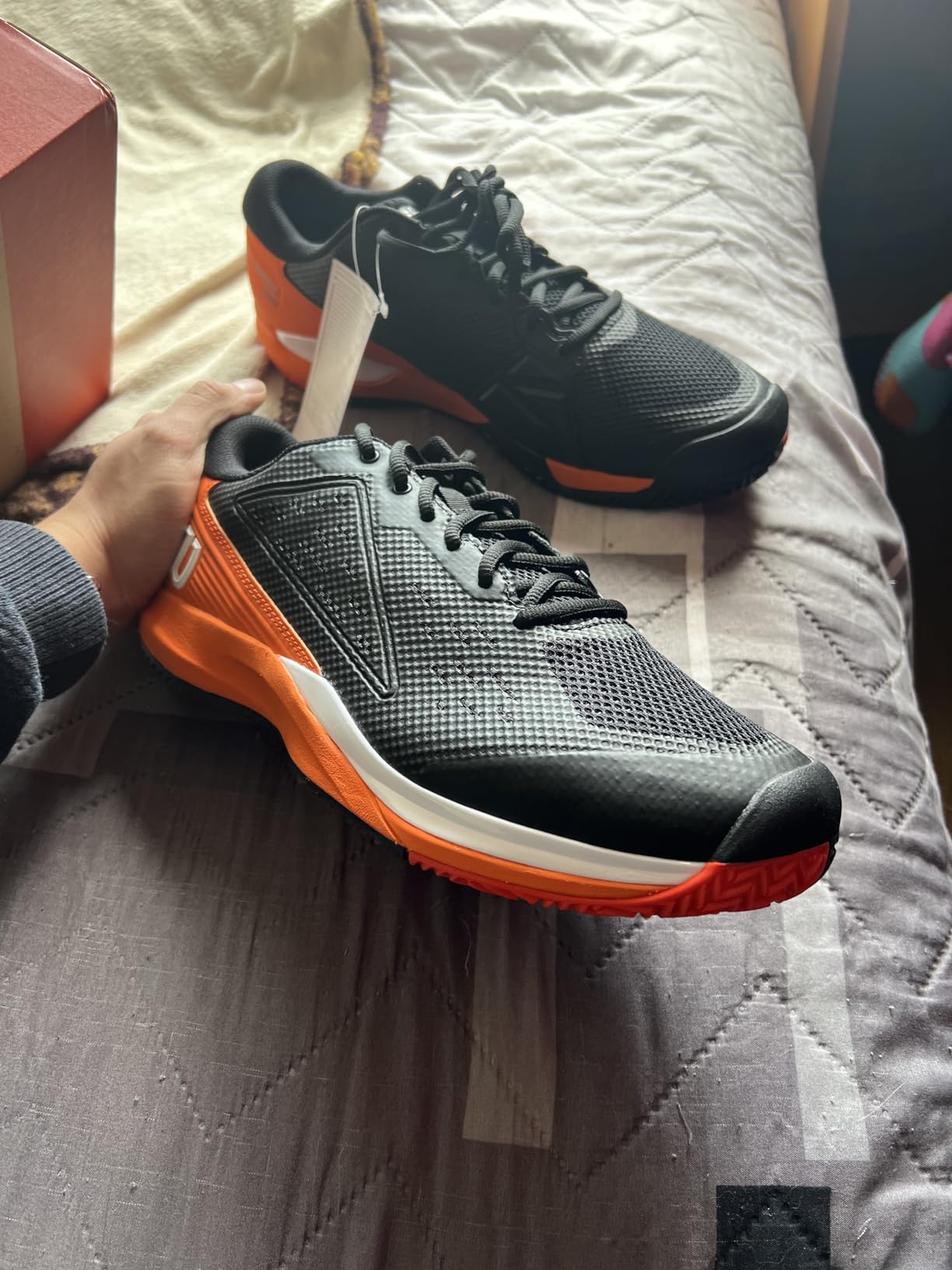 Wilson Rush Pro Ace side profile view highlighting the Sensifeel upper material and 4D support chassis structure