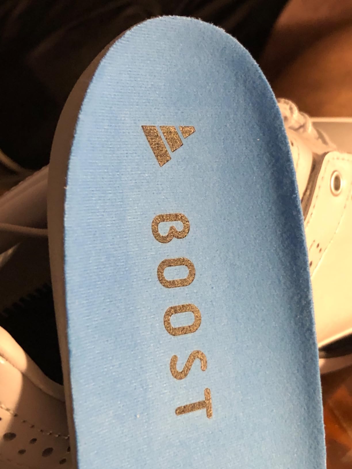 Side profile of Adidas MC80 golf shoe highlighting classic design elements