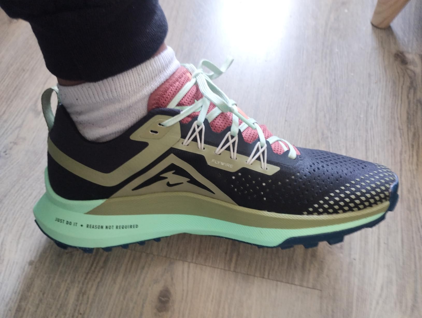 Nike Men's Trail Running Sneaker full lateral view showing ReactX foam midsole and engineered mesh upper