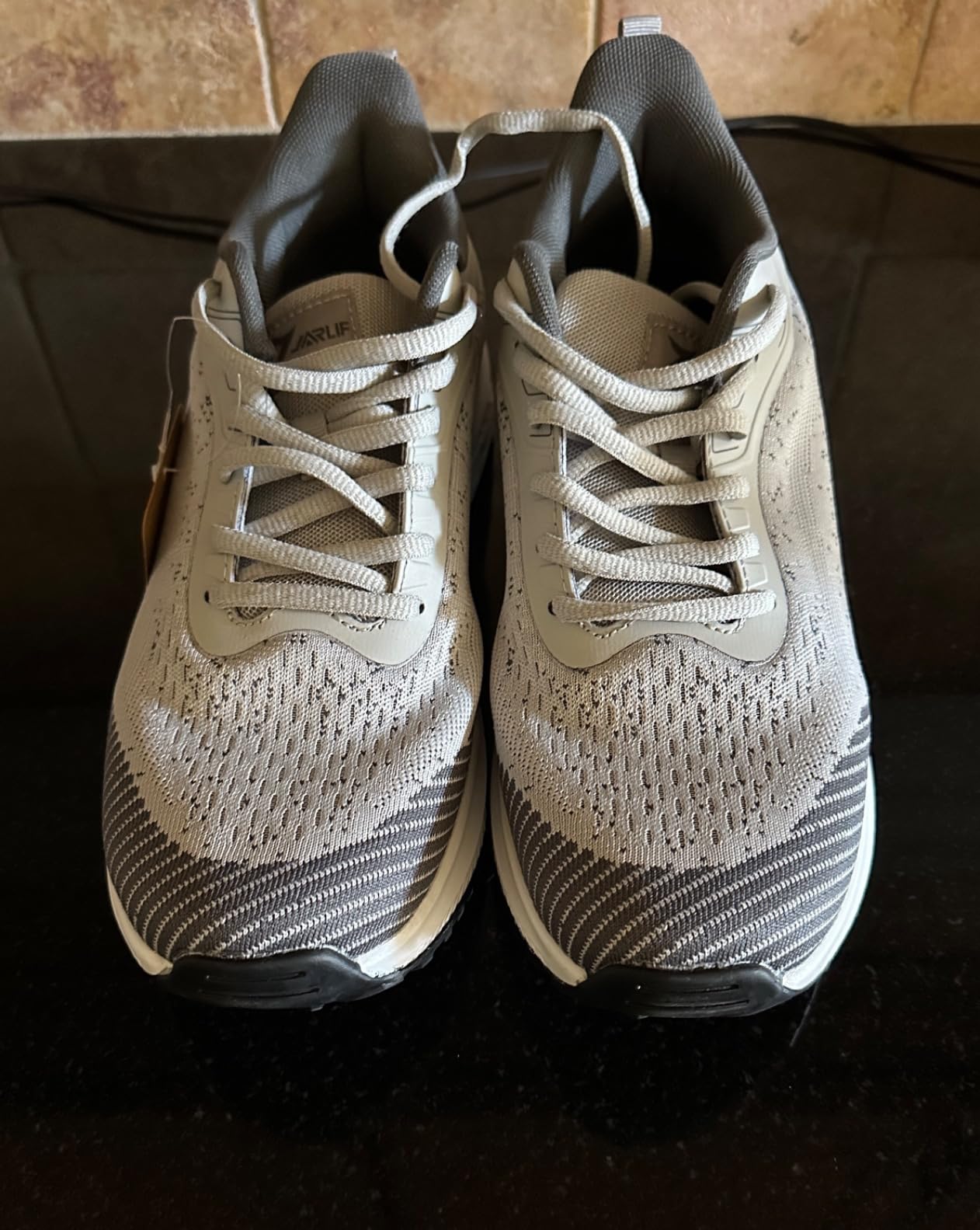 RomenSi walking shoes worn during outdoor walking showing performance on pavement and sidewalks