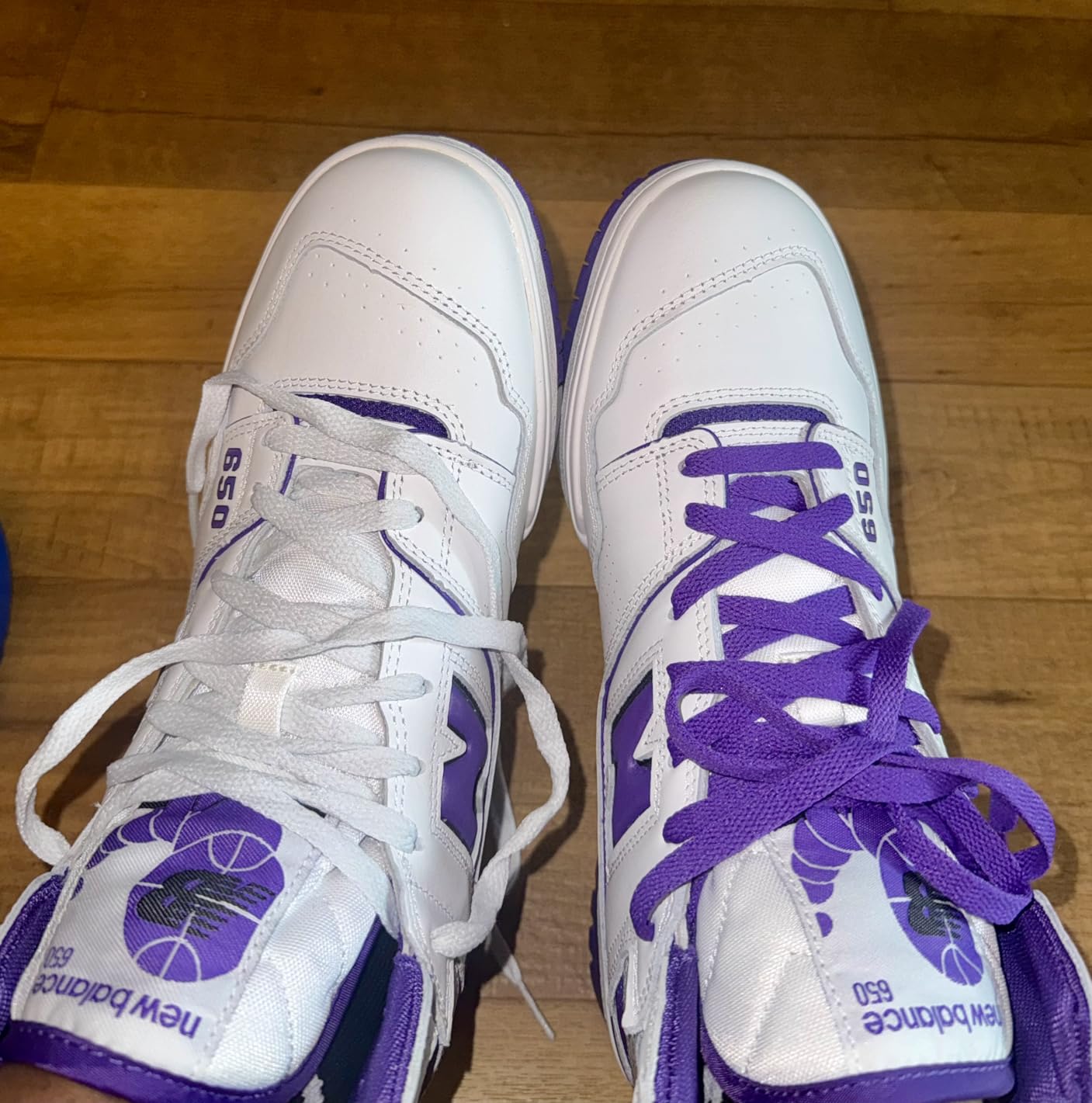 VSUDO purple laces installed on white sneakers showing color contrast and flat lace design