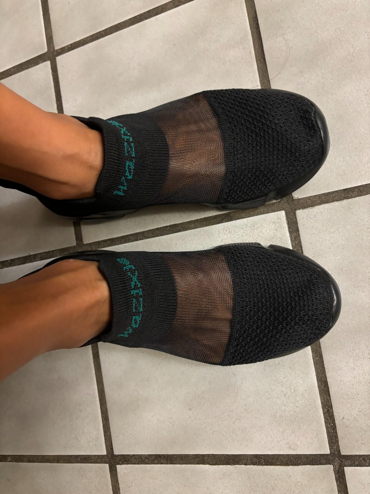 FLOWING PLUME shoes mesh construction close-up showing breathable yet waterproof design