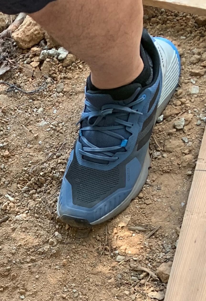 Adidas Terrex Soulstride trail running shoe black carbon grey colorway showing mesh upper and Traxion outsole