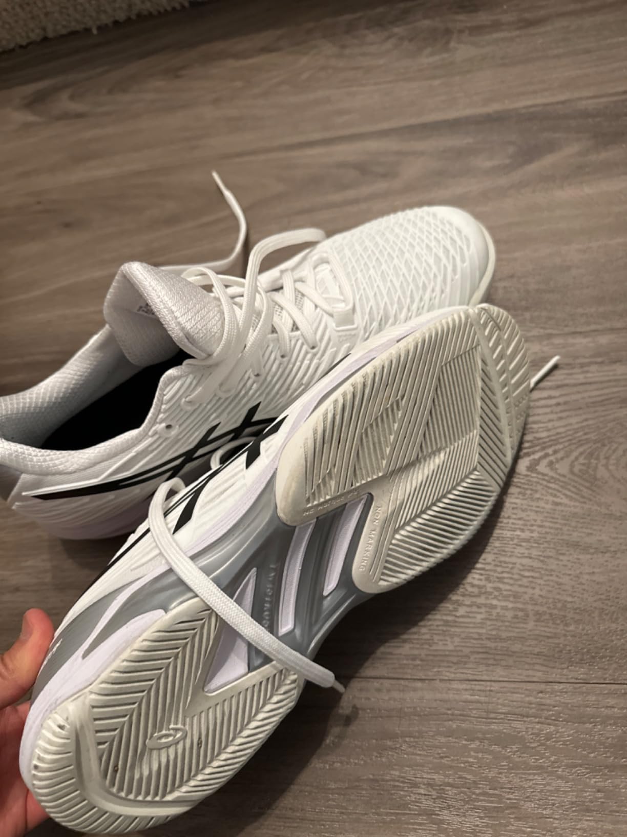 ASICS Solution Speed FF 2 detail shot showing DYNAWRAP technology and PU upper construction