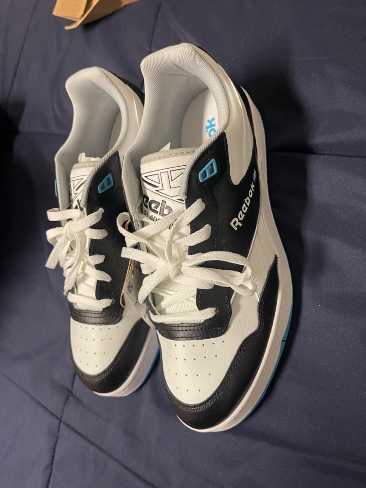 Reebok BB 4000 II shown in multiple colorways demonstrating style versatility