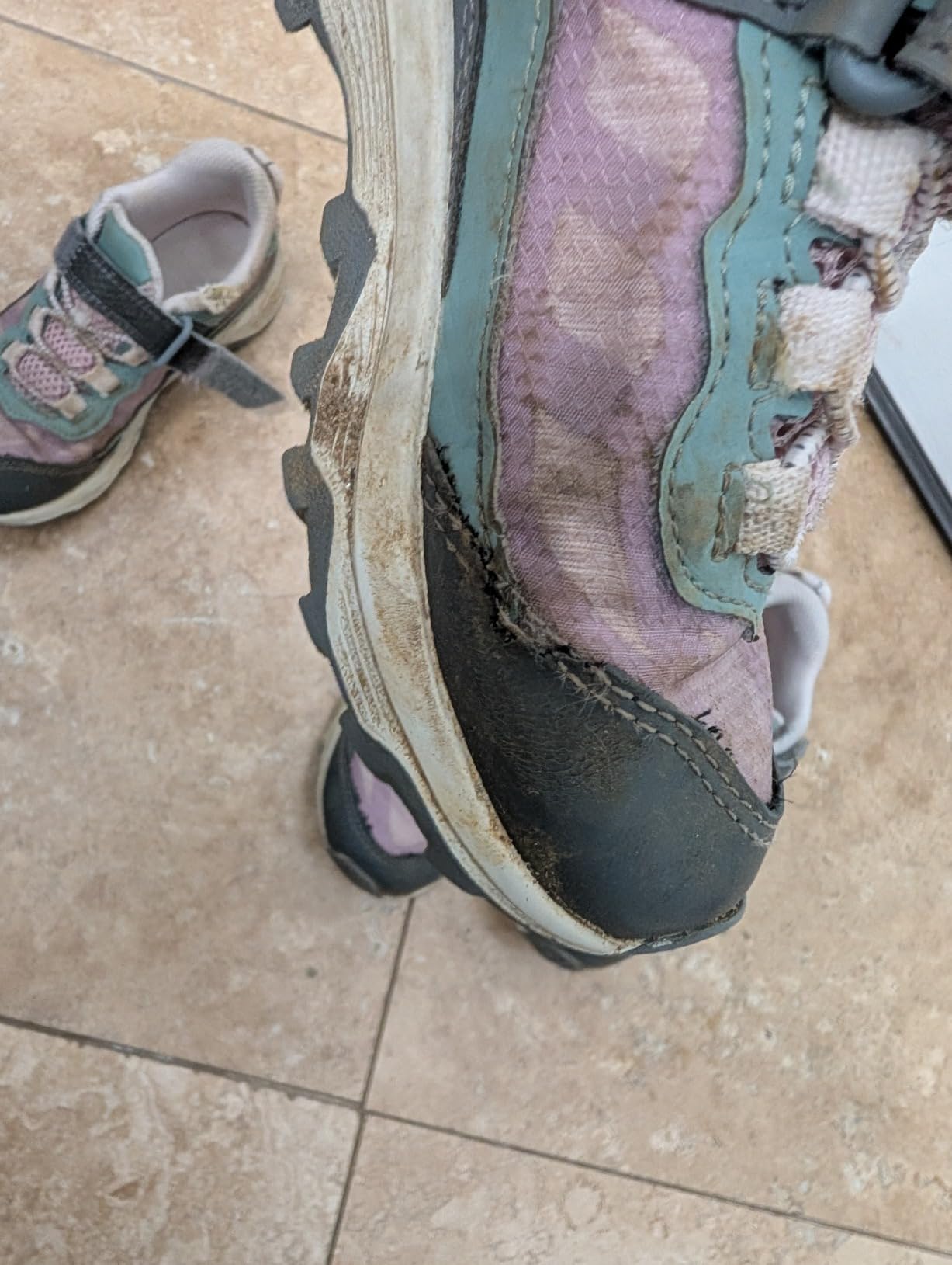 Seam separation and wear damage on Merrell Kids Moab Speed Low after 2 months of testing