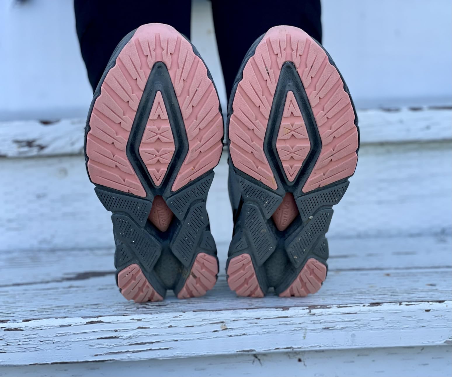 NORTIV 8 hiking shoes being tested for water resistance in wet conditions