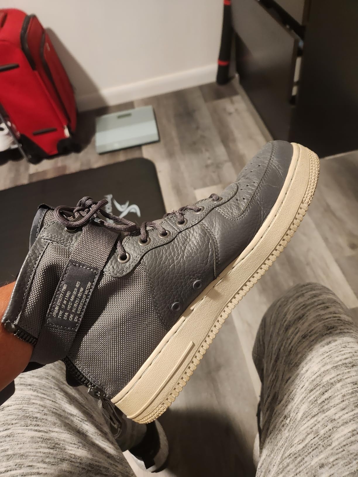 White sneakers after 3 weeks of wear showing durability of Wilkins Sneaker Whitener coating