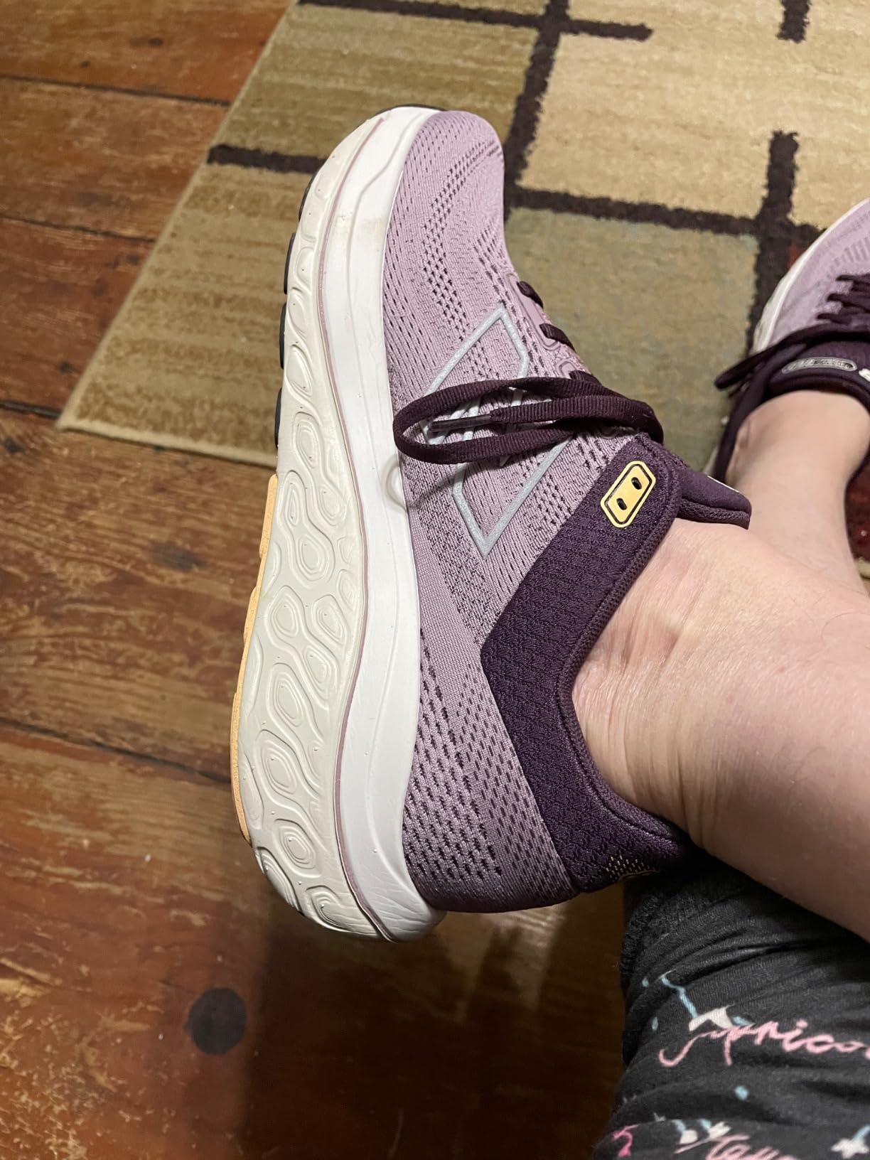 Close-up of New Balance 860 V14 engineered mesh upper with stability features and synthetic overlays