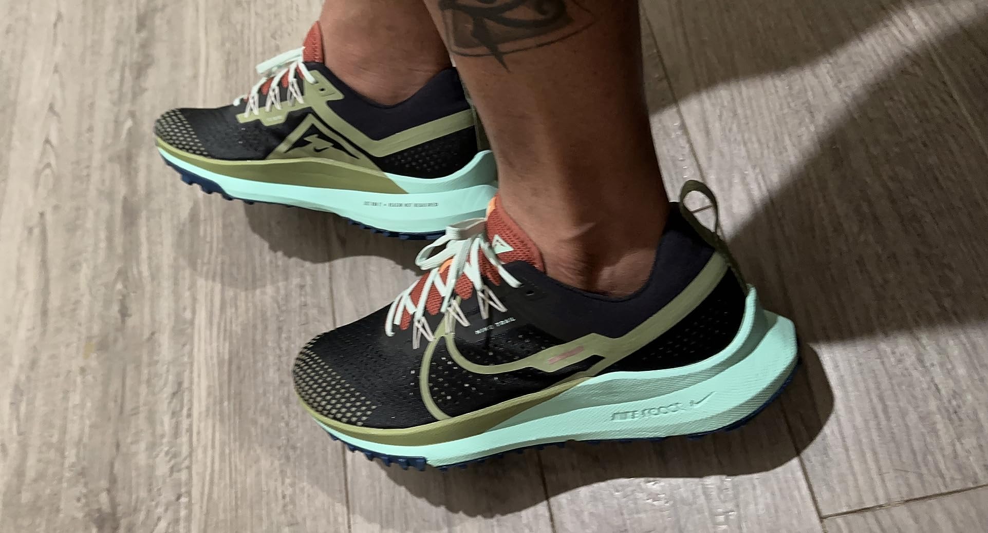 Nike trail shoe outsole showing aggressive rubber tread pattern for trail traction