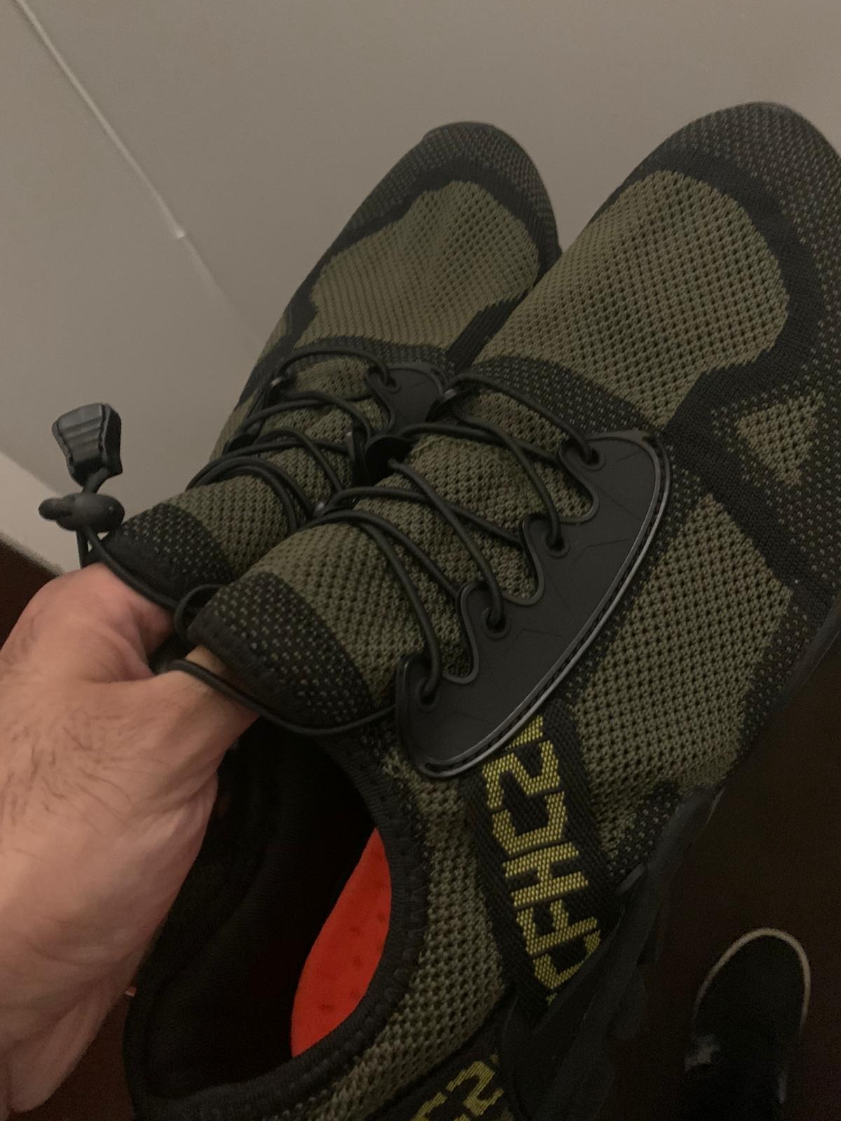 ABAO Hiking Shoes in black colorway showing full shoe design with knitted mesh upper and elastic lacing system