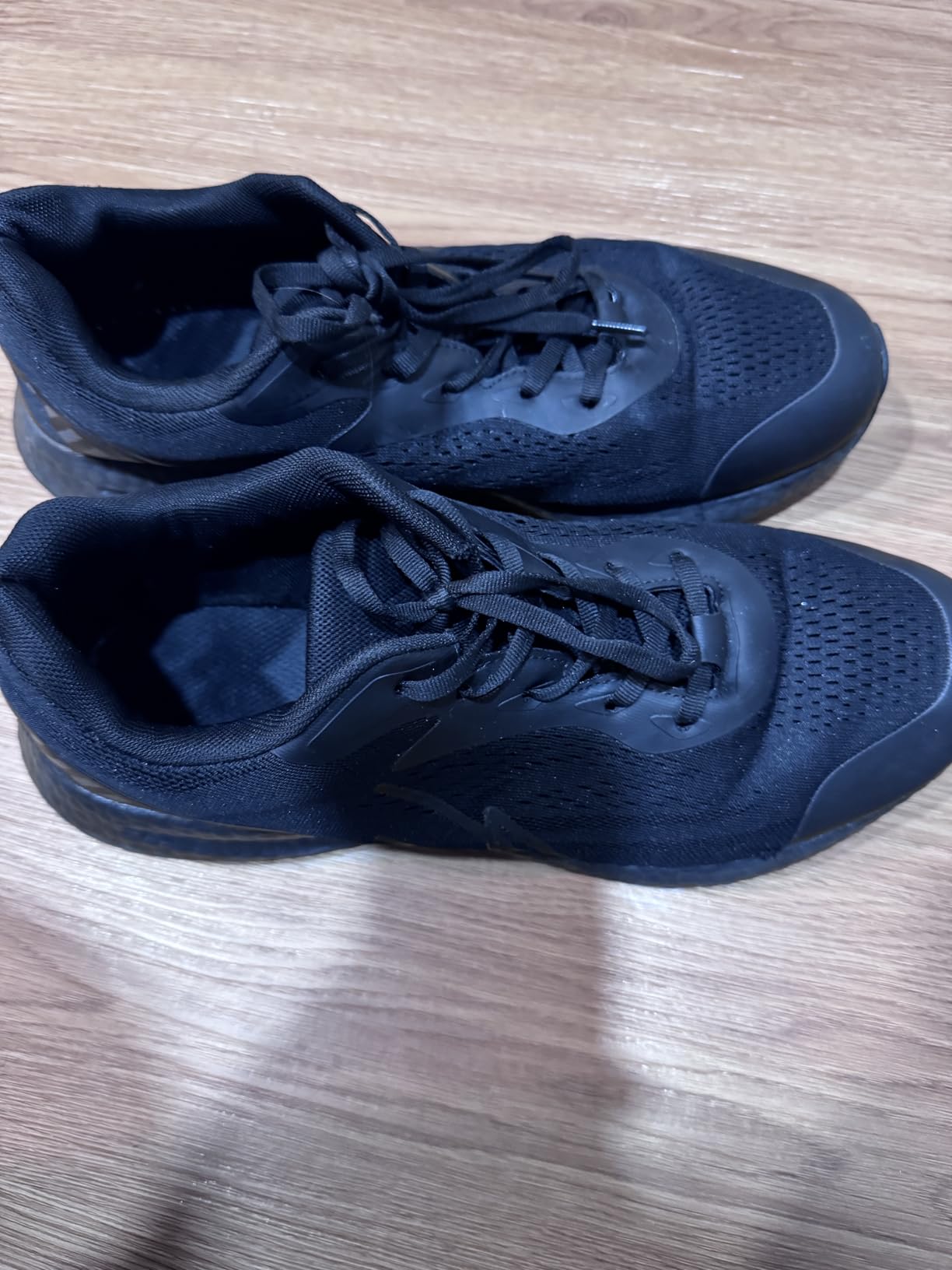 NY Threads Men's Running Shoe on white background showing full side profile view