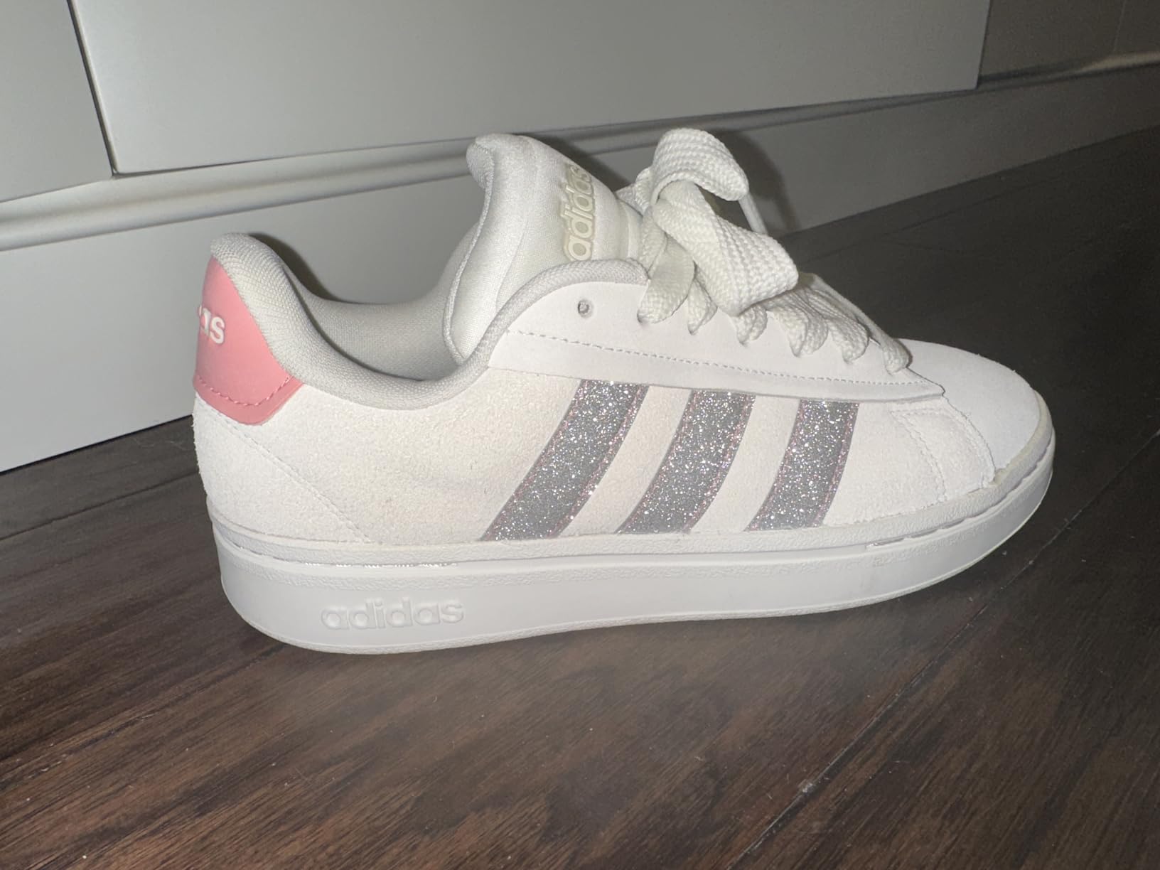 Adidas Women's Grand Court Alpha 00s sneakers showing chunky 90s silhouette with sparkly stripes