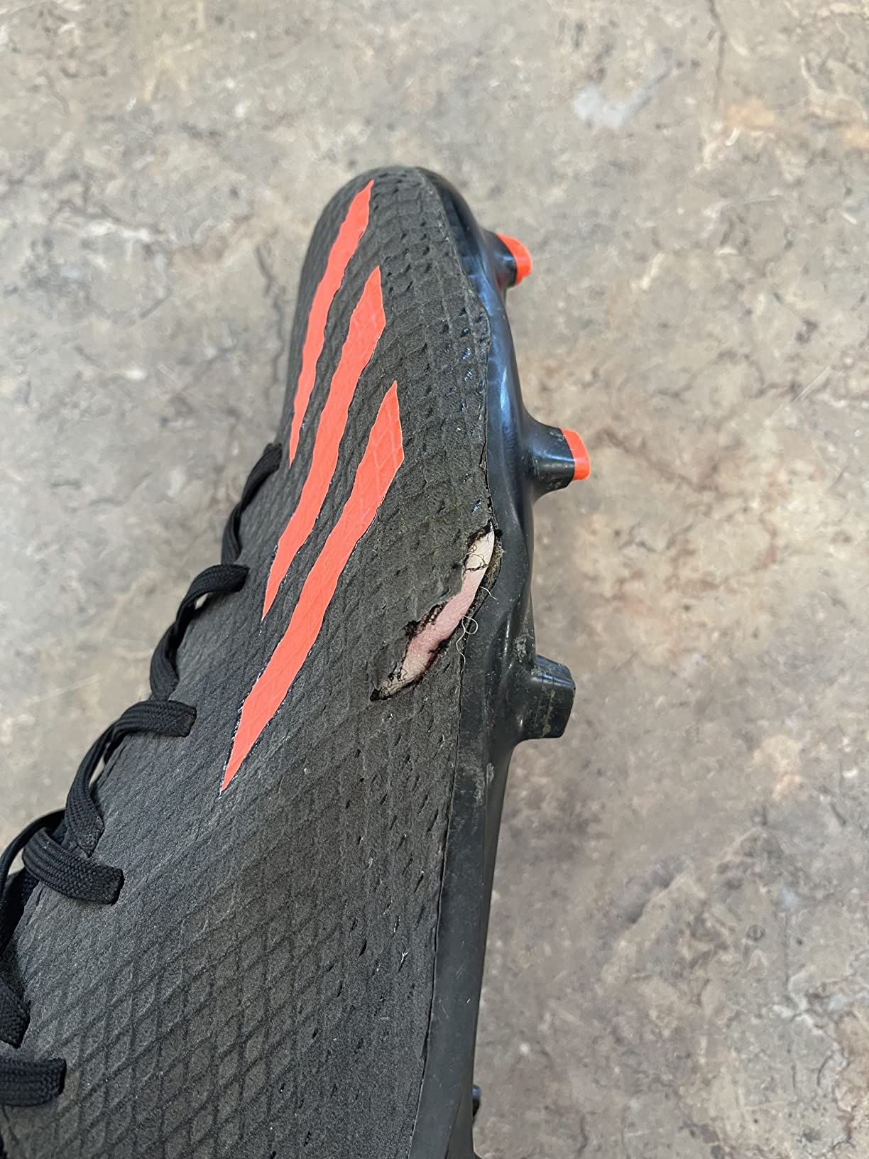 Multiple Adidas X Speedportal.3 cleats showing identical side failure pattern after short-term use