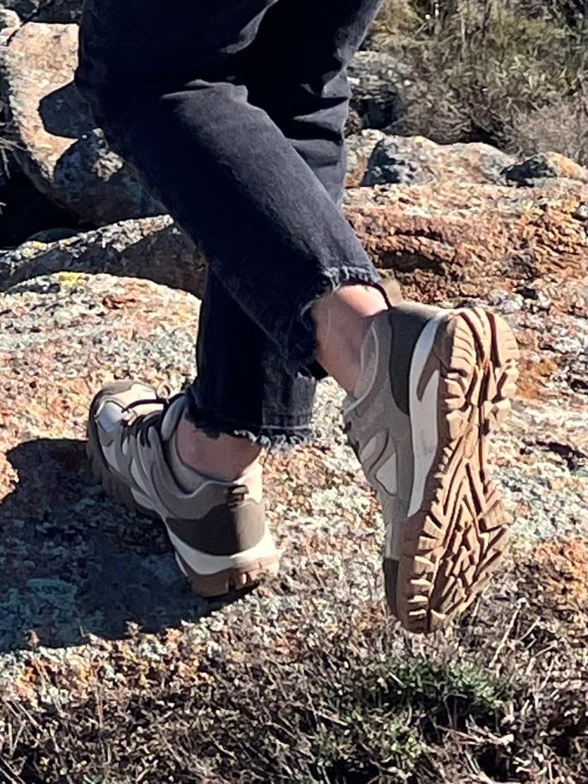 CC-Los waterproof hiking shoes being tested on wet terrain showing water beading off the surface