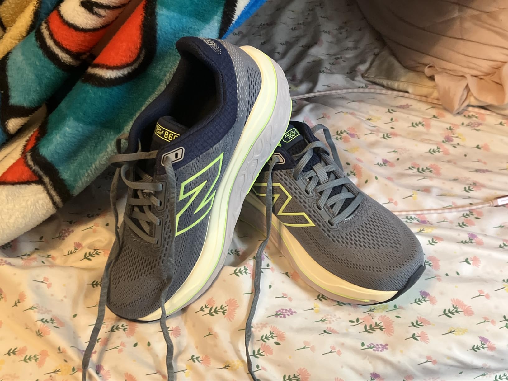 New Balance Women's Fresh Foam X 860 V14 in purple colorway showing engineered mesh upper and stability design features